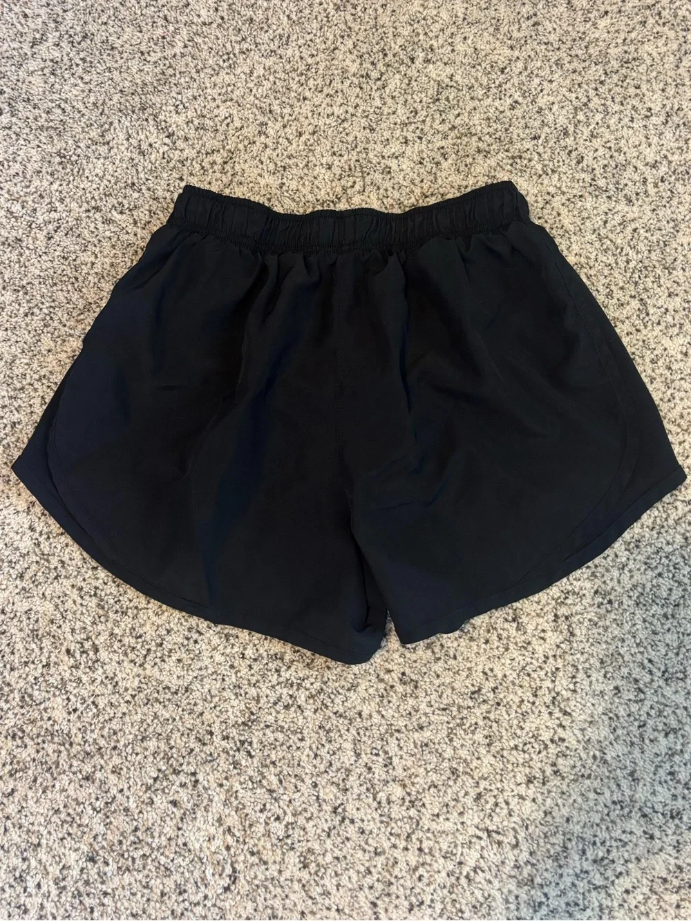 Black Nike running shorts